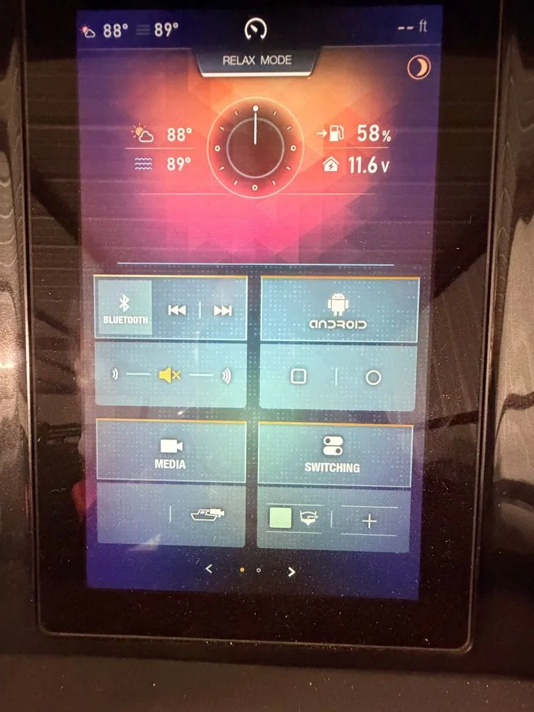 Slide: The Image of The image shows a modern boat control panel with a touchscreen and various functions. - 13
