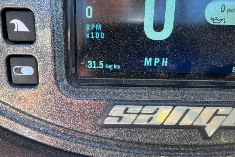 Slide: The Image of Close-up of a 2019 Sanger 212 SL dashboard displaying 31.5 engine hours. - 22