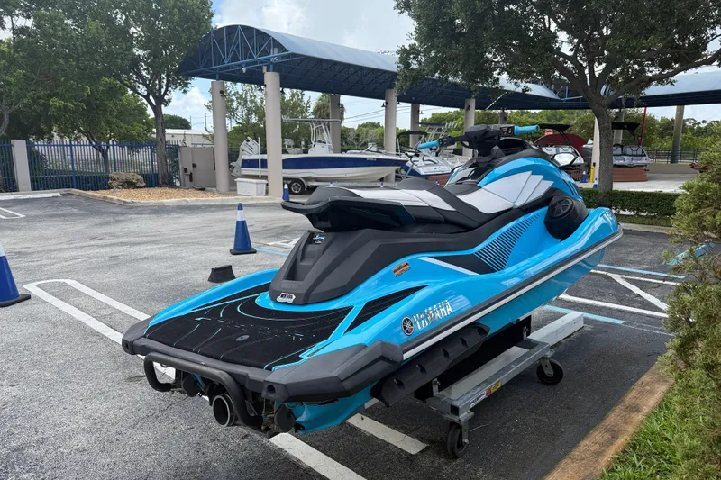 Slide: The Image of 2022 Yamaha WaveRunner GP1800R in a parking lot, vibrant blue color. - 14