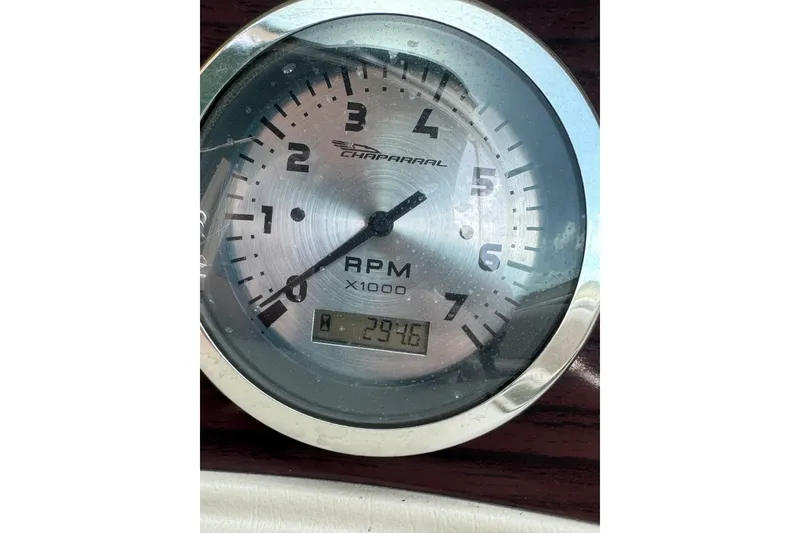 Slide: The Image of Close-up of a Chaparral 216 SSi 2000 RPM gauge displaying 291.5 hours. - 9