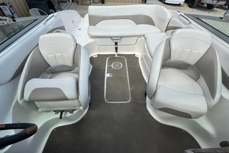 Slide: The Image of 2007 Kayot Z 220 boat interior with white and gray seating arrangement. - 12
