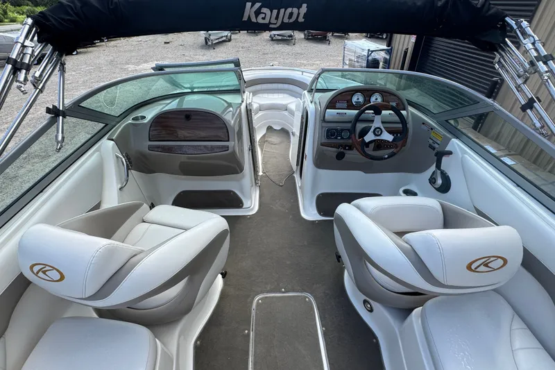 Slide: The Image of 2007 Kayot Z 220 boat interior with white seating and steering console. - 6