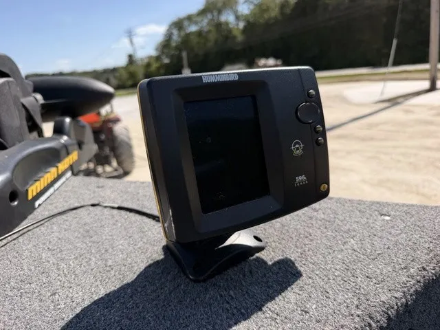 Slide: The Image of A Humminbird fish finder mounted on a boat. - 11