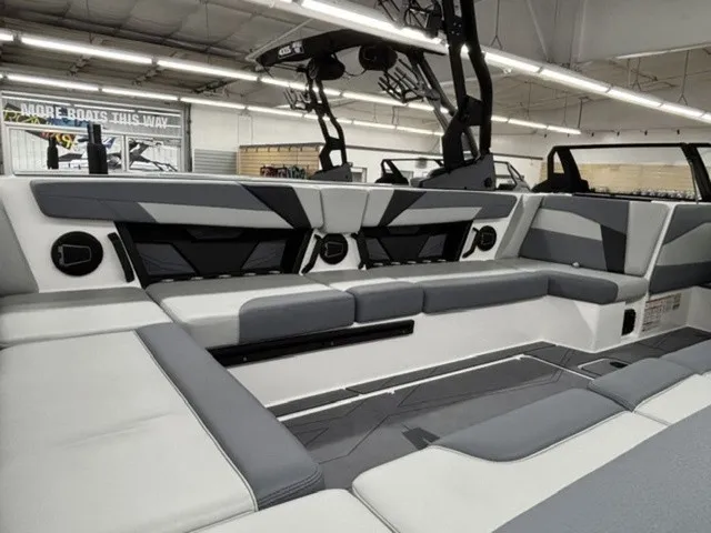 Slide: The Image of Interior of a 2027 Axis Wake Research T250 with gray and white upholstery. - 11