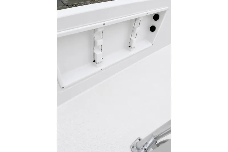Slide: The Image of 2021 Bayliner Element F21 boat interior detail with storage compartment and fixtures. - 10