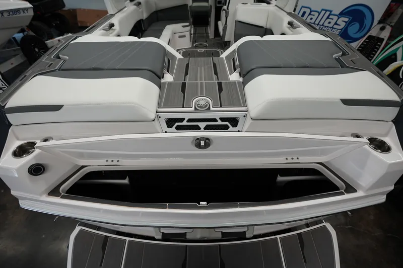 Slide: The Image of 2023 Supra SA 450 boat interior with sleek seating and modern design. - 12