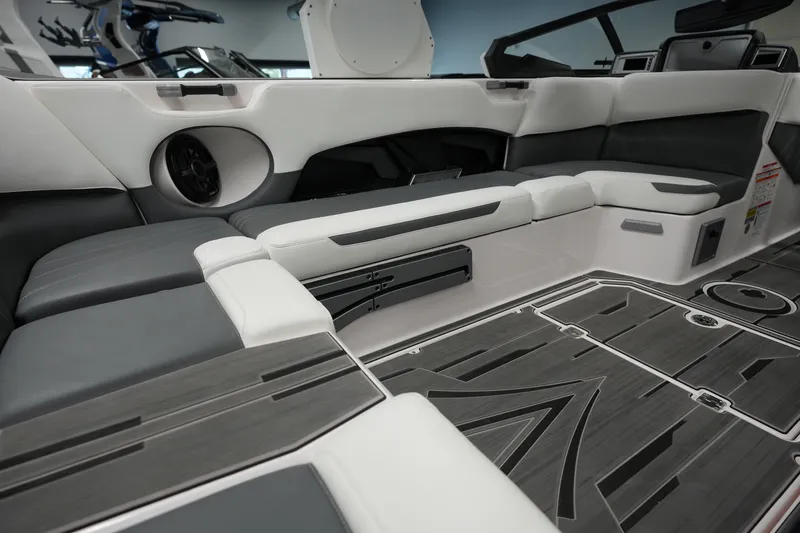 Slide: The Image of Luxurious interior of 2023 Supra SA 450 boat with sleek seating and modern design. - 16