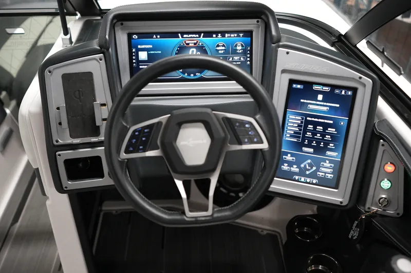 Slide: The Image of 2023 Supra SA 450 dashboard with advanced digital displays and modern steering wheel design. - 21