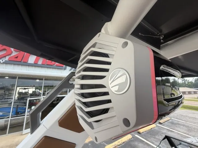 Slide: The Image of Close-up of a speaker on a boat, featuring a modern design and a logo. - 25