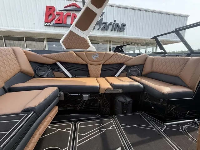 Slide: The Image of The image shows the luxurious interior of a 2027 Tigé Z1 boat with elegant seating. - 18