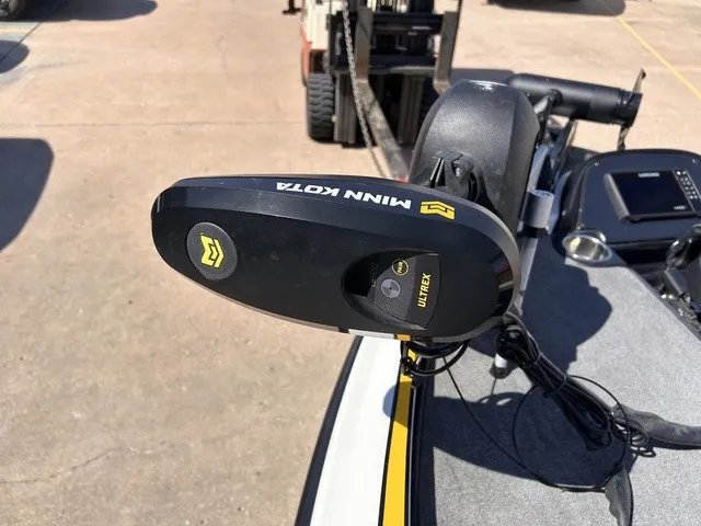 Slide: The Image of A Minn Kota Ulterra trolling motor is mounted on a boat. - 17