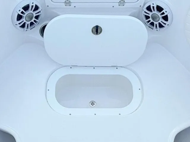 Slide: The Image of The image shows a white boat seat with built-in speaker and storage compartment. - 9