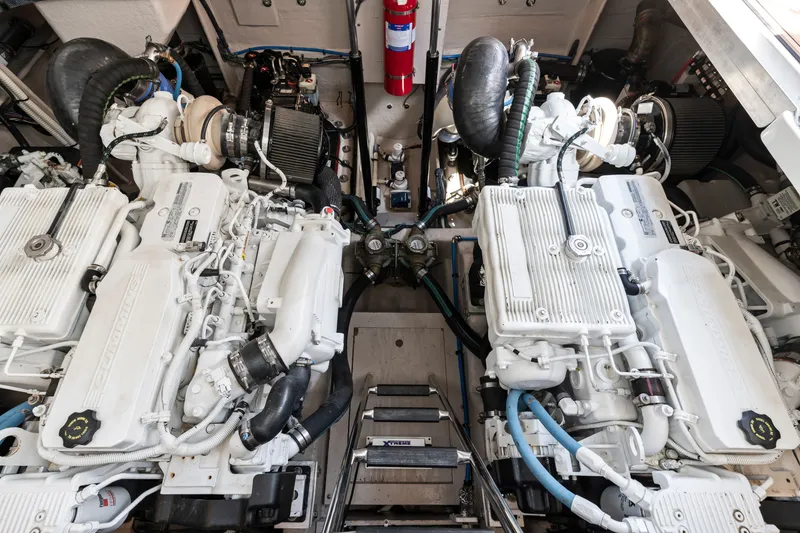 Slide: The Image of Twin Cummins Diesel QSB engines with under 300 hours at the time of photos. Oil samples available. - 44