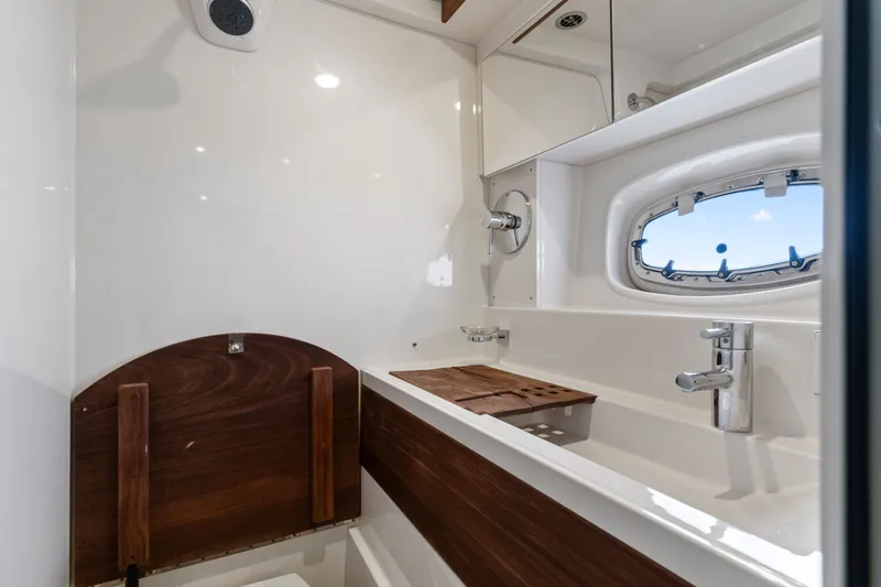 Slide: The Image of Luxurious bathroom interior of 2013 Sea Ray 410 Sundancer yacht with modern fixtures. - 20
