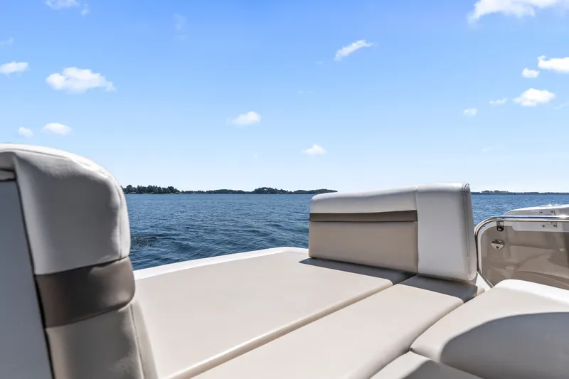 Slide: The Image of Luxury seating on a 2013 Sea Ray 410 Sundancer yacht with ocean view. - 30