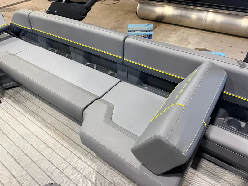 Slide: The Image of Gray seating with yellow stitching on a boat. - 35