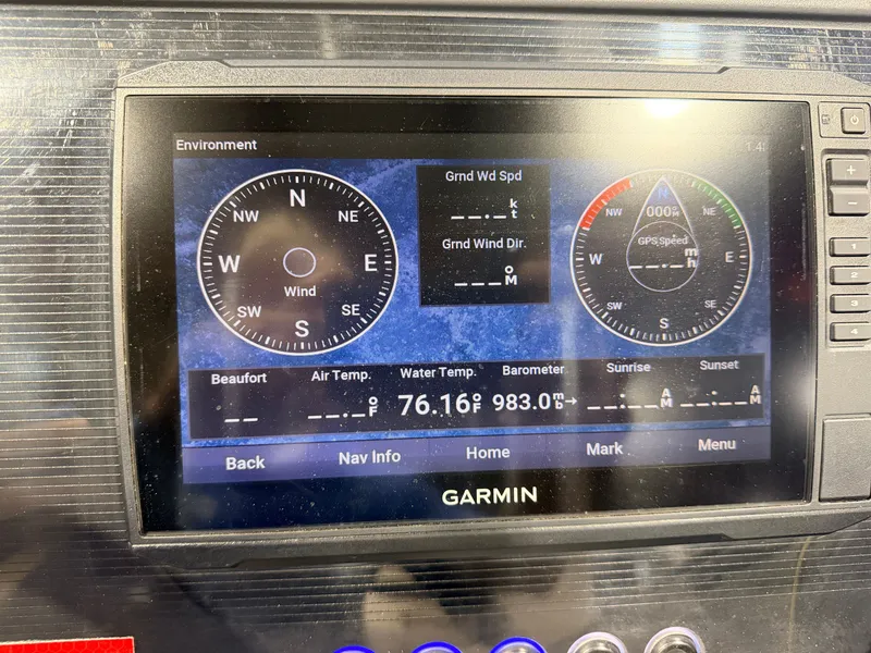 Slide: The Image of A Garmin screen displays wind direction, air and water temperature, and sunrise and sunset times. - 22