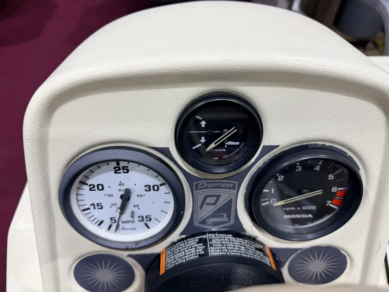 Slide: The Image of Dashboard of a Premier 180 Horizon with Honda 4-stroke engine. - 22