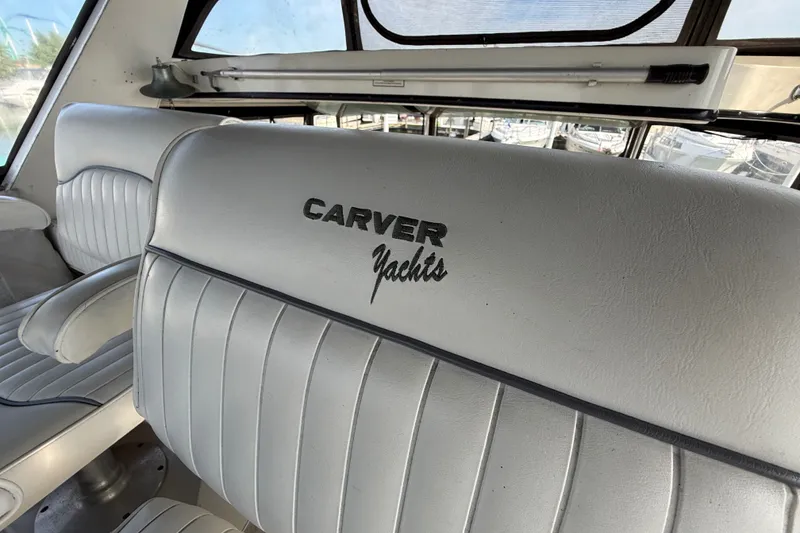 Slide: The Image of 1989 Carver 3807 Aft Cabin Motor Yacht interior with branded seating. - 19
