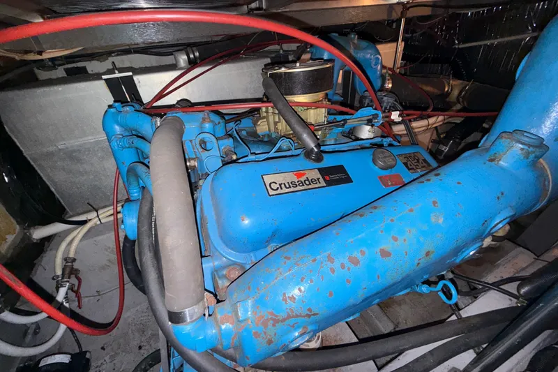 Slide: The Image of Engine of 1989 Carver 3807 Aft Cabin Motor Yacht, featuring Crusader branding. - 68