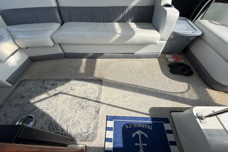 Slide: The Image of Interior of 1989 Carver 3807 Aft Cabin Motor Yacht with seating and carpet. - 11