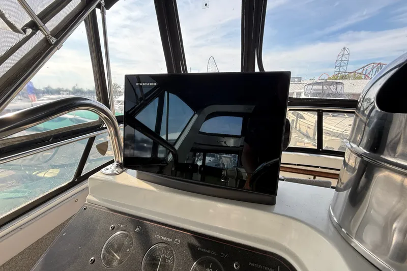 Slide: The Image of Helm of 1989 Carver 3807 Aft Cabin Motor Yacht with Furuno display. - 21