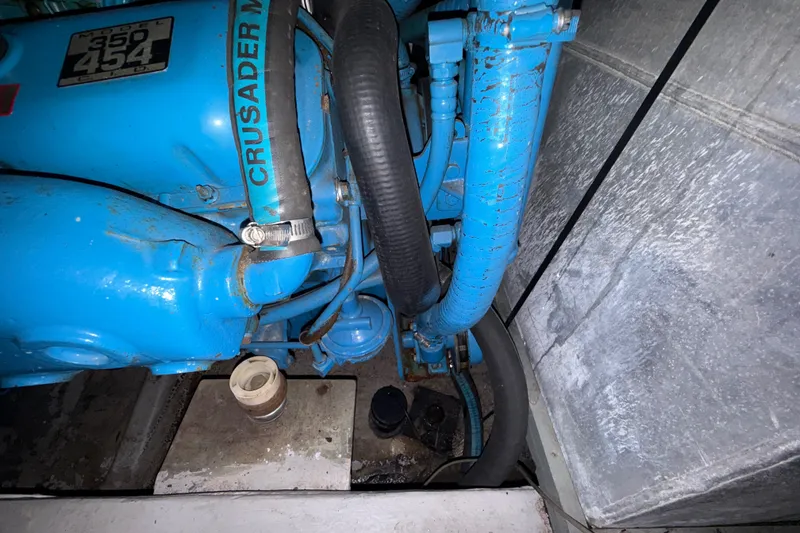 Slide: The Image of Engine compartment of 1989 Carver 3807 Aft Cabin Motor Yacht with Crusader Marine engine. - 72