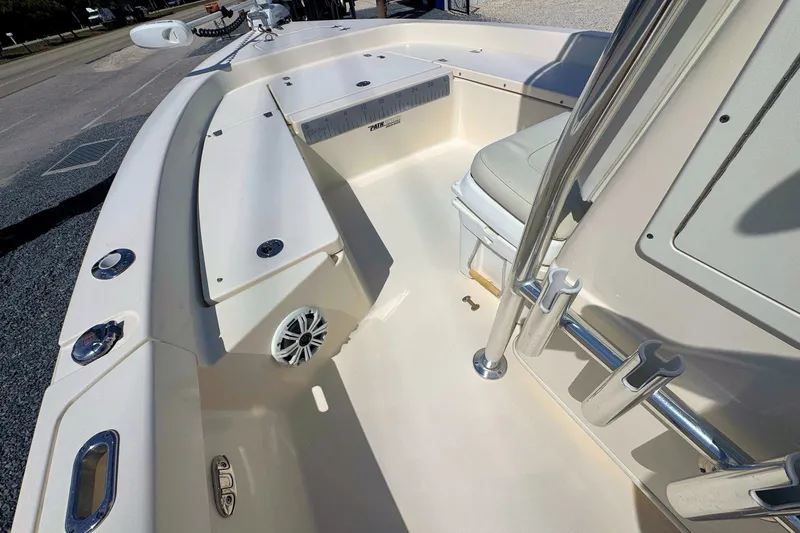 Slide: The Image of 2015 Pathfinder 2200 Tournament Edition boat interior with seating and storage compartments. - 15