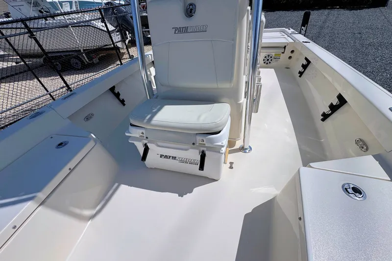 Slide: The Image of 2015 Pathfinder 2200 Tournament Edition boat interior with seating and storage compartments. - 19