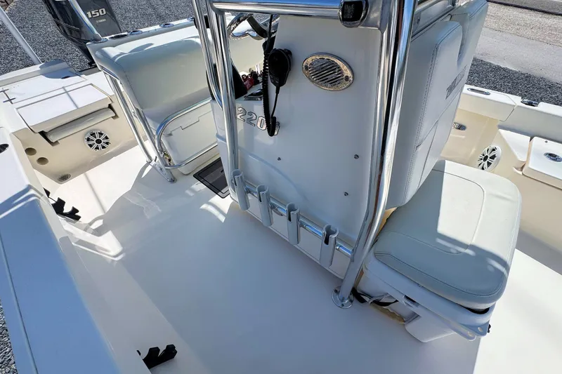 Slide: The Image of 2015 Pathfinder 2200 Tournament Edition boat interior with seating and console details. - 14
