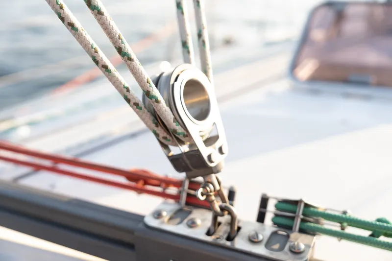 Slide: The Image of Close-up of Catalina 400 MkII sailboat rigging, showcasing ropes and hardware, 2000 model. - 16