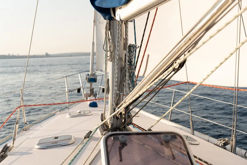 Slide: The Image of Sailing on a 2000 Catalina 400 MkII yacht, open sea view, clear skies. - 13