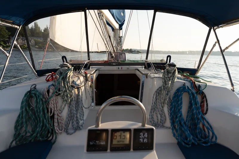 Slide: The Image of Cockpit view of a 2000 Catalina 400 MkII sailboat with ropes and instruments. - 10