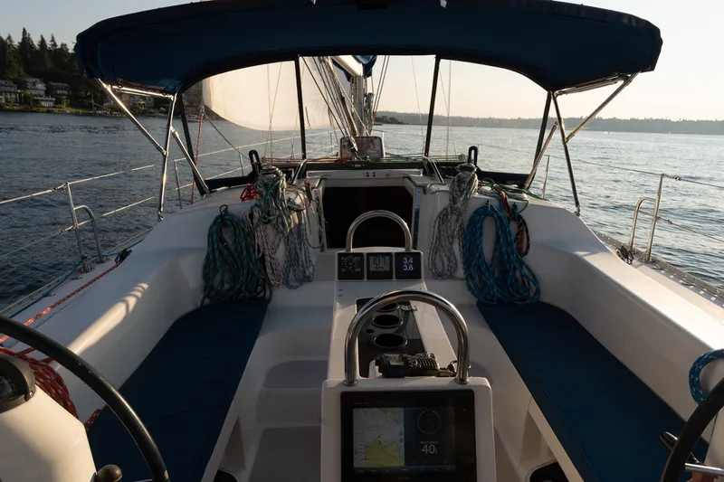 Slide: The Image of Cockpit view of 2000 Catalina 400 MkII sailboat on calm water. - 6
