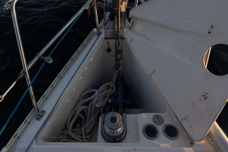 Slide: The Image of Anchor locker of a 2000 Catalina 400 MkII sailboat with ropes and winch. - 42