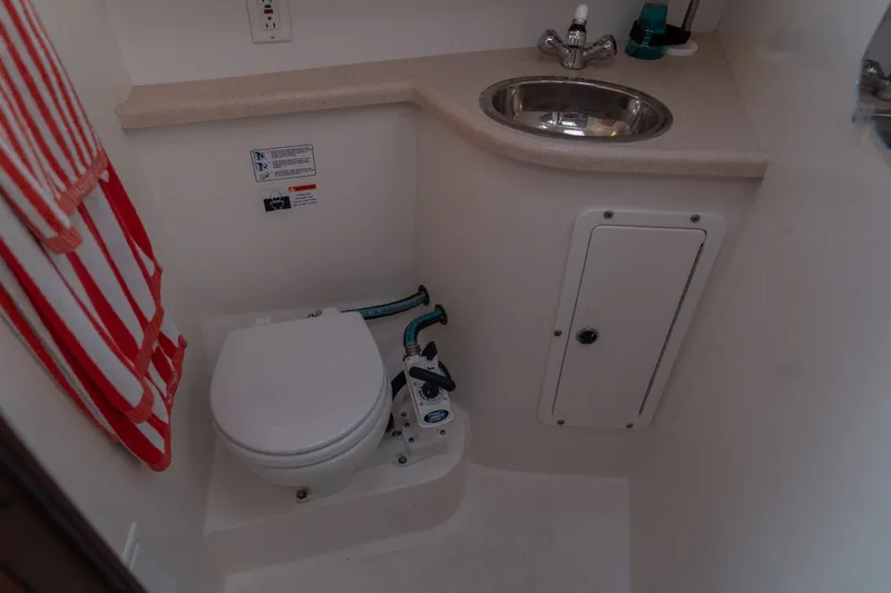 Slide: The Image of Compact bathroom in a 2000 Catalina 400 MkII yacht with toilet and sink. - 37