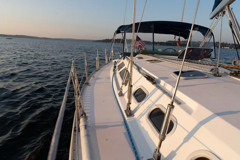 Slide: The Image of Sailing on a 2000 Catalina 400 MkII yacht during sunset on a calm sea. - 43