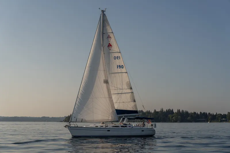 Slide: The Image of Sailing yacht Catalina 400 MkII 2000 gliding on calm waters at sunset. - 3
