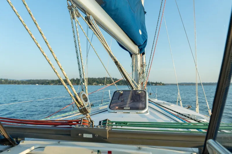 Slide: The Image of Sailing on a 2000 Catalina 400 MkII yacht with blue skies and calm waters. - 40