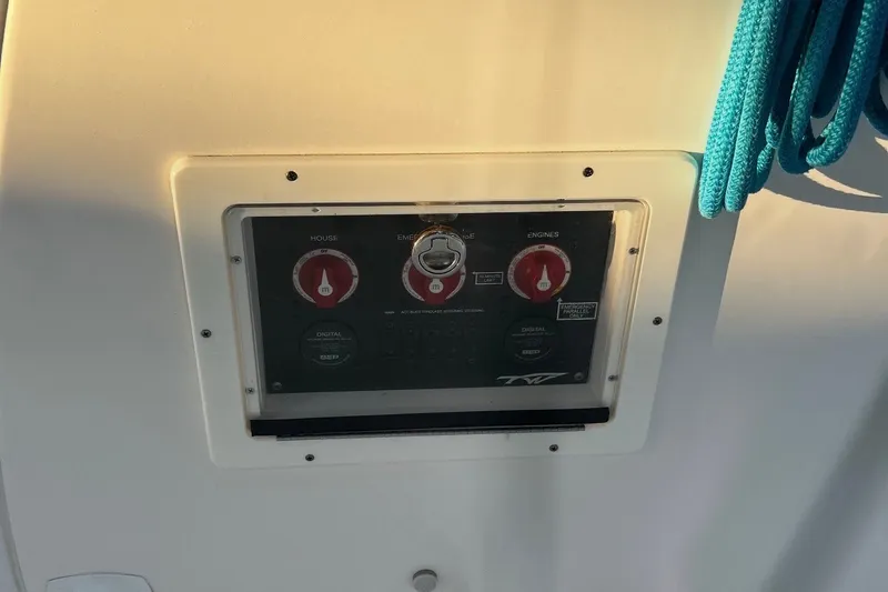 Slide: The Image of Control panel of a 2021 Tidewater 272 CC Adventure boat with blue rope. - 19