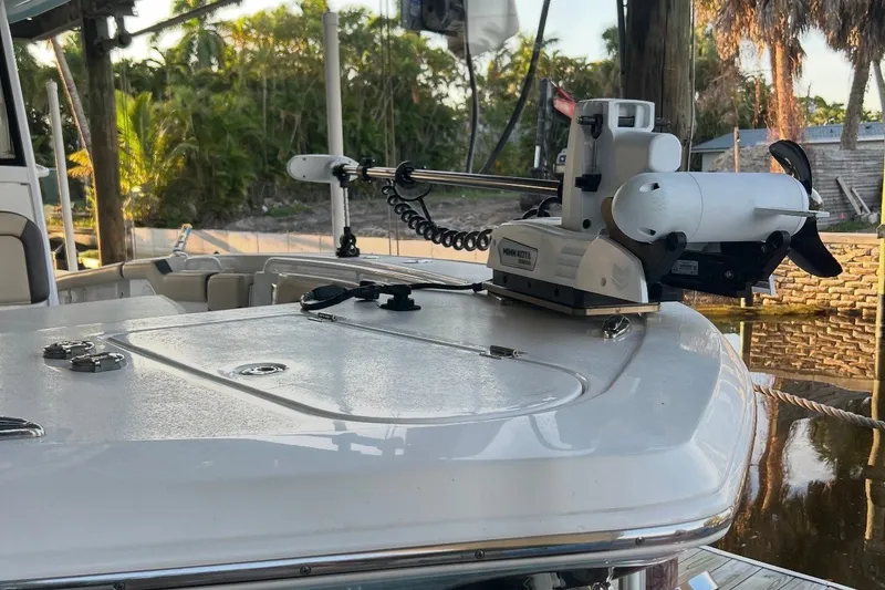 Slide: The Image of 2021 Tidewater 272 CC Adventure boat with Minn Kota trolling motor on deck. - 4