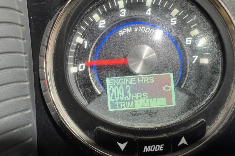 Slide: The Image of Close-up of Sea Ray SDX 270 tachometer displaying 203.3 engine hours. - 16