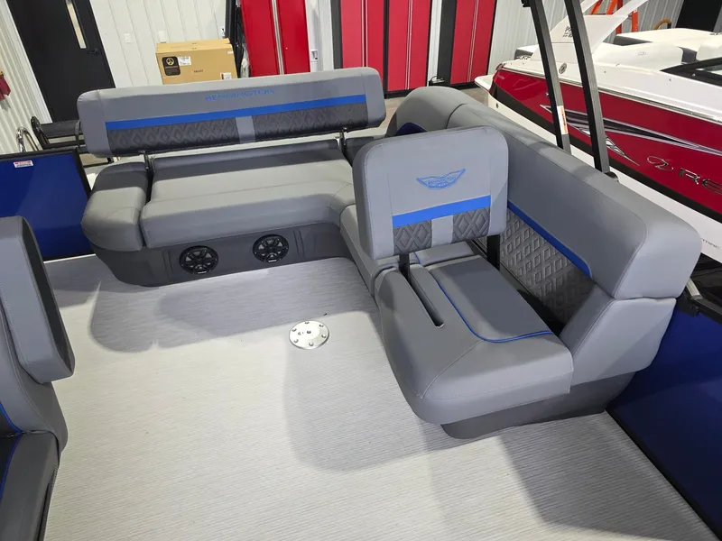 Slide: The Image of The image shows the interior of a 2027 Bennington 21ML SPS TRI with gray and blue seating. - 11