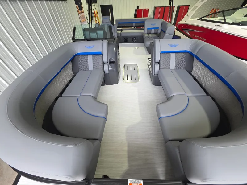 Slide: The Image of The image shows the interior of a 2027 Bennington 21ML SPS TRI with gray upholstery. - 6