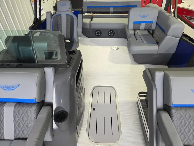 Slide: The Image of Interior of a modern boat with gray and blue upholstery and a helm station. - 7