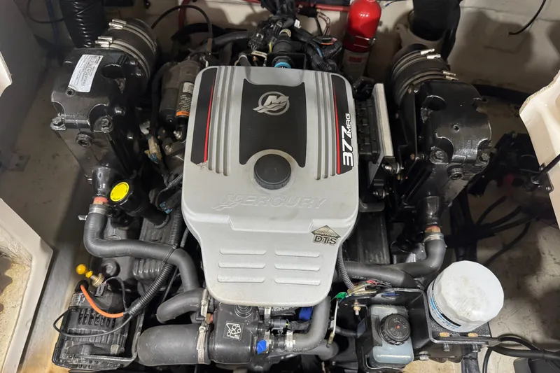 Slide: The Image of Engine of a 2008 Sea Ray 240 Sundeck boat, featuring a Mercury 377 MAG. - 14