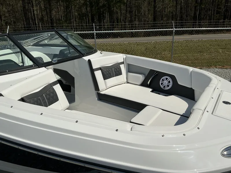 Slide: The Image of The image shows the cockpit of a 2025 Monterey M-22 boat with white upholstery. - 4