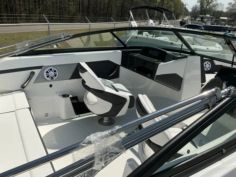 Slide: The Image of The image shows the cockpit of a 2025 Monterey M-22 boat with modern seating and controls. - 9