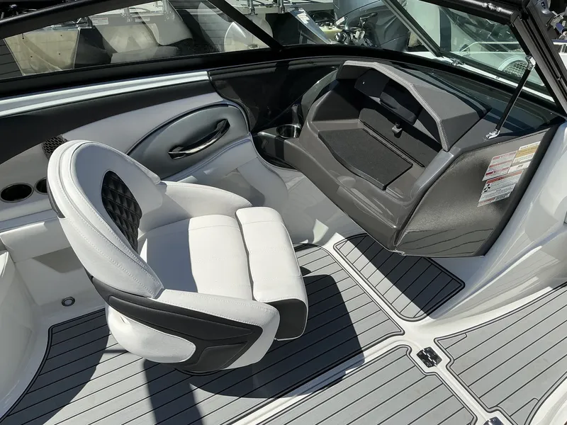 Slide: The Image of Interior of a 2025 Monterey 224FS with gray and white seating and modern dashboard. - 16
