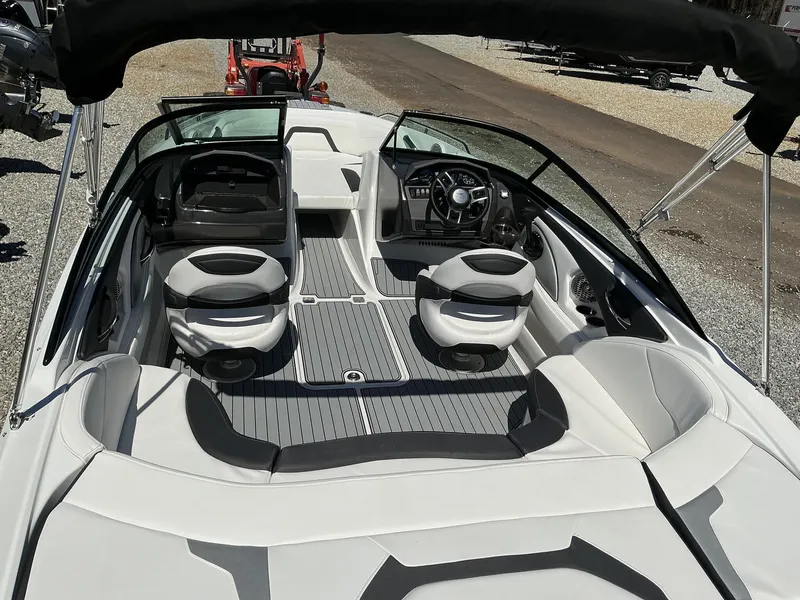 Slide: The Image of The image shows the cockpit of a 2025 Monterey 224FS boat with modern seating and controls. - 7
